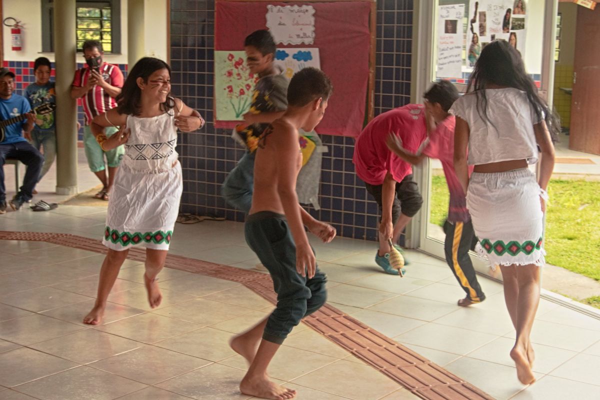 Guarani kids dancing in the school